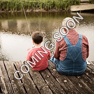 Boy and Grandpa fishing sitting off pier
